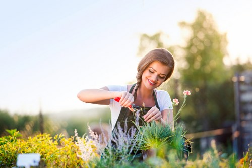 Gardener working safely with tools in an outdoor setting